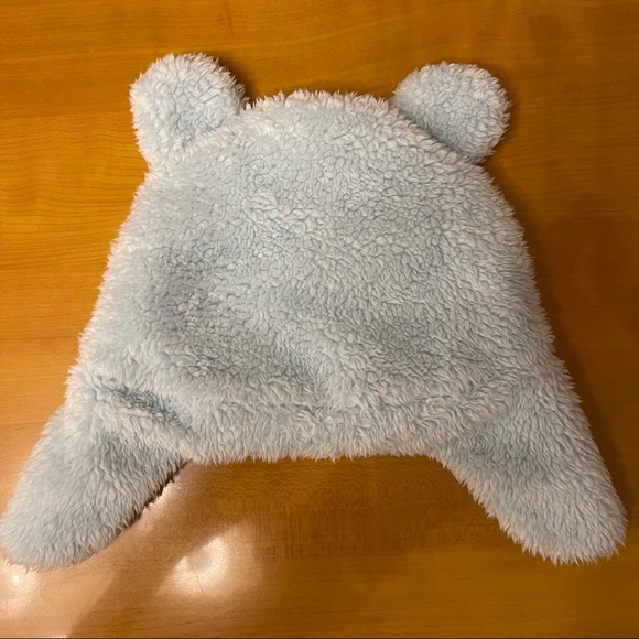 Winter hat with ear flaps - Picture 2 of 3